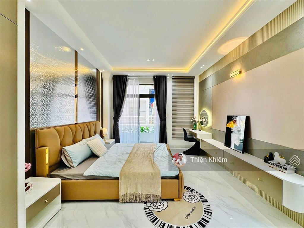 Nhà bán đối diện vincom phan văn trị  p.7  gv  4.25m x 13m  4 lầu mới