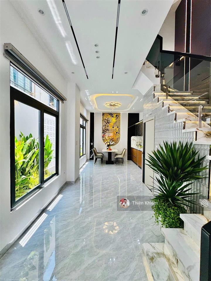 Nhà bán đối diện vincom phan văn trị  p.7  gv  4.25m x 13m  4 lầu mới