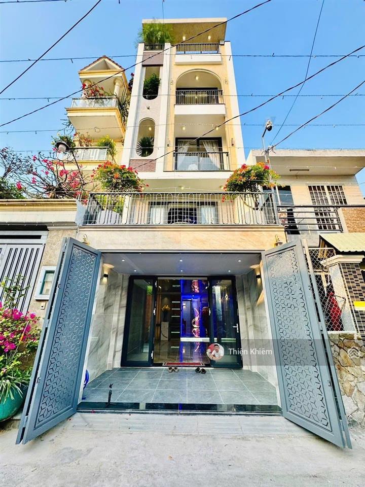 Nhà phố có thang máy 4.2m x 18.5m đường phạm văn chiêu  p.9  gò vấp  đường 6m oto vào nhà