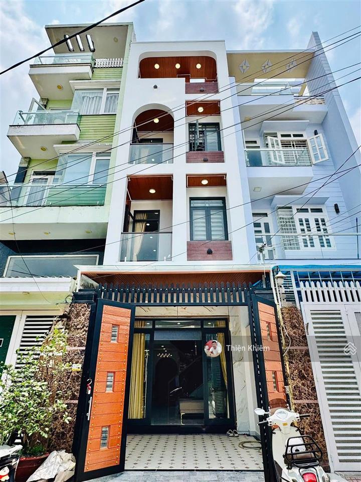Nhà bán đường 8m oto thông phan huy ích  p.12  gò vấp  4m x 17m  4 lầu xây mới