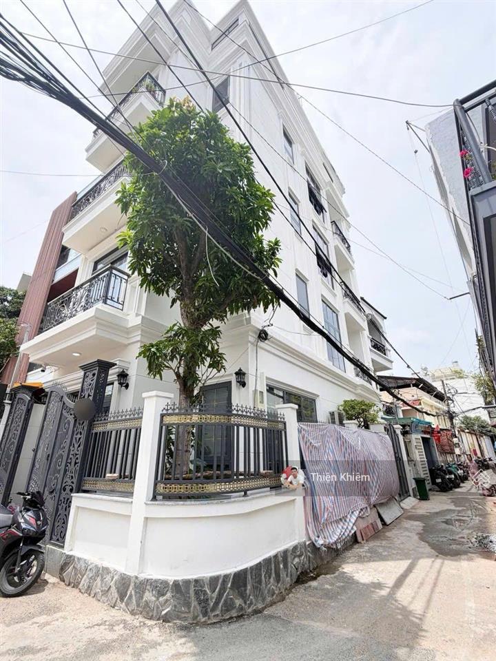 Nhà bán bề ngang 6m có thang máy góc 2 mặt tiền đường quang trung  p10  gò vấp