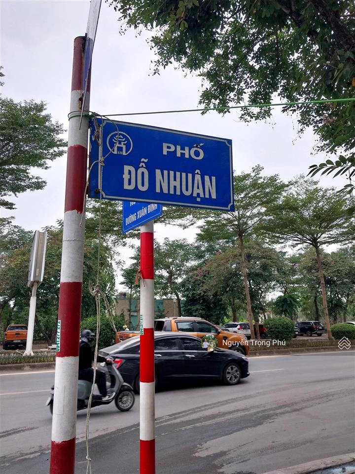 Bán nhà đất tại phố đỗ nhuận, bắc từ liêm  lô góc  vỉa hè 103m2  4t mt 20m, 33.6 tỷ. 0981 585 ***