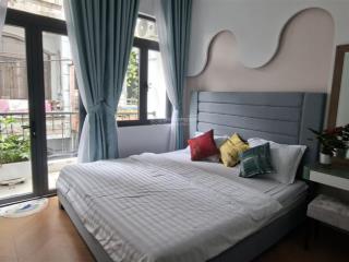 Hai bà trưng q.16m x 15m 4 tầng sân thượng9 phòng căn hộ dịch vụthu nhập ổn định 72 triệu/th