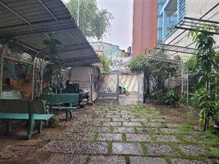 5 tầng mặt tiền đường q.pn8m x 23m5 tầng sân thượng,sân rộng đậu 34 ô tô xe hơi2km ra sân bay