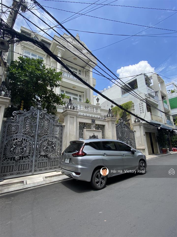Bán nhà đối diện chợ tân bình  đường lạc long quân, lê minh xuân  dt 4.5x26m, kc cũ tiện xây mới