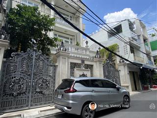 Bán nhà đối diện chợ tân bình  đường lạc long quân, lê minh xuân  dt 4.5x26m, kc cũ tiện xây mới