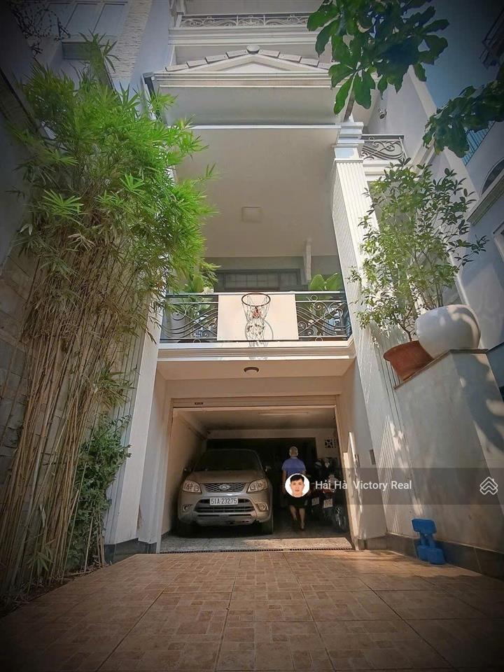 Bán nhà hxh 6m đường cửu long, khu sân bay  dt 5x21m nhà đẹp hầm 3 lầu, phù hợp ở và làm văn phòng