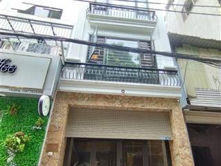 Bán nhà  phố nguyễn khánh toàn 52m x 5t thang máy  gara ô tô  giá 22.6 tỷ.