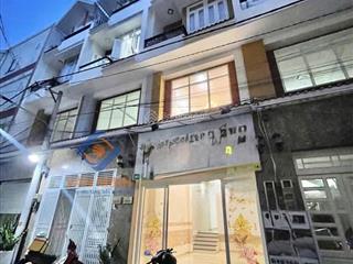 Nhà 4 tầng ngay mặt tiền ql13  kdc hồng đào đẹp và an ninh  có gara ô tô