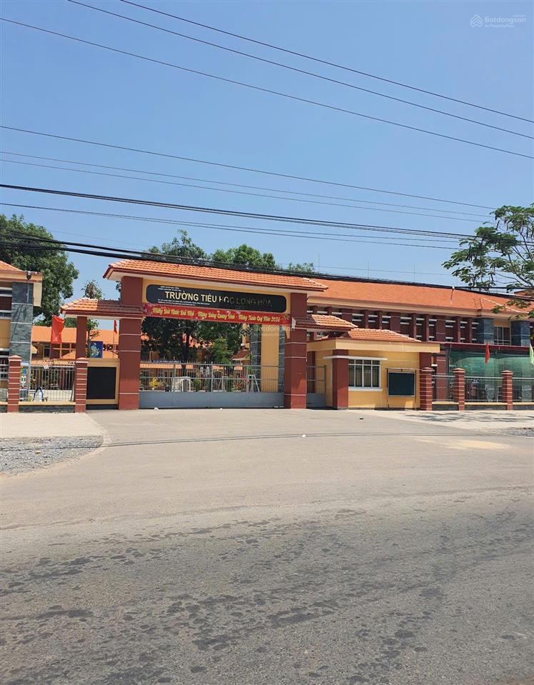 Bán lô đất ngay chợ long hòa, dầu tiếng, đường qh 16m, 5x40m thổ cư 100m2, giá 590 triệu