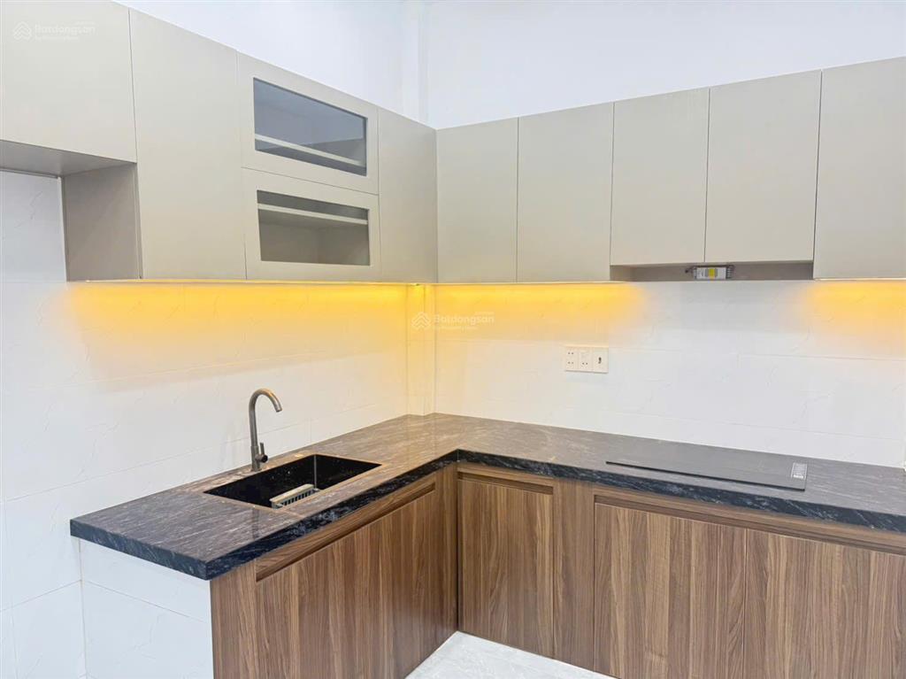 Sang căn nhà 97,5m2 mới 100% nội thất đầy đủ mặt tiền vĩnh phú 42 xe ô tô, sổ hồng