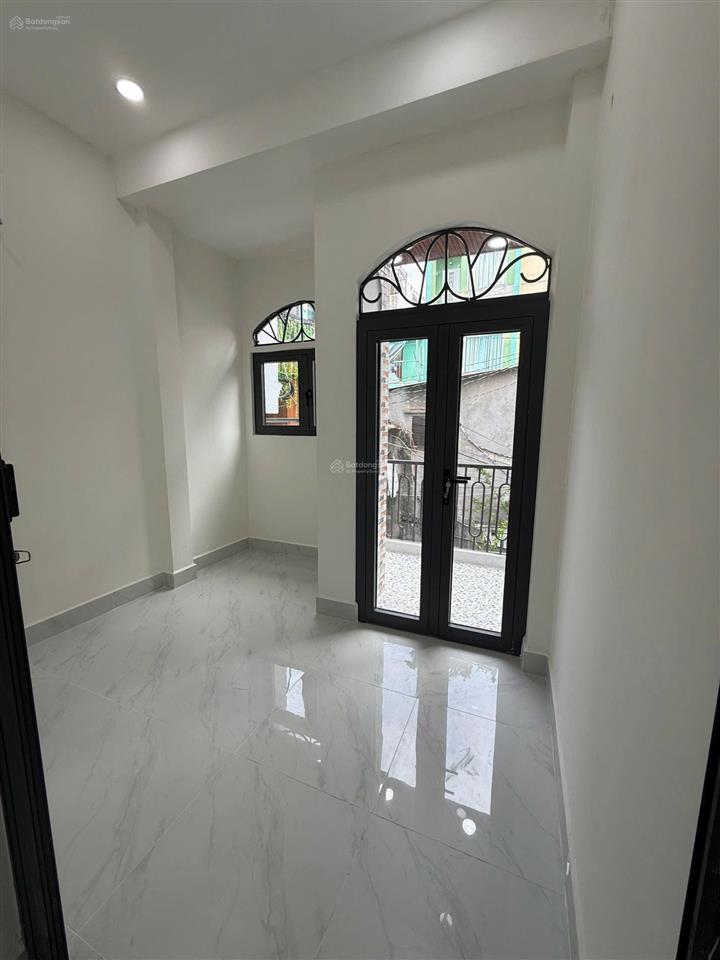 Bán nhà đường 100 bình thới quận 11 chia 2 căn dt 3m* 11,3 m nở hậu 6,5 m giá 4 tỷ 8 hẻm xe hơi