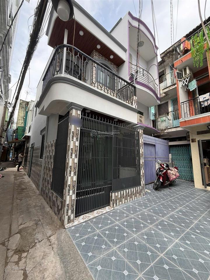 Bán nhà đường 100 bình thới quận 11 chia 2 căn dt 3m* 11,3 m nở hậu 6,5 m giá 4 tỷ 8 hẻm xe hơi