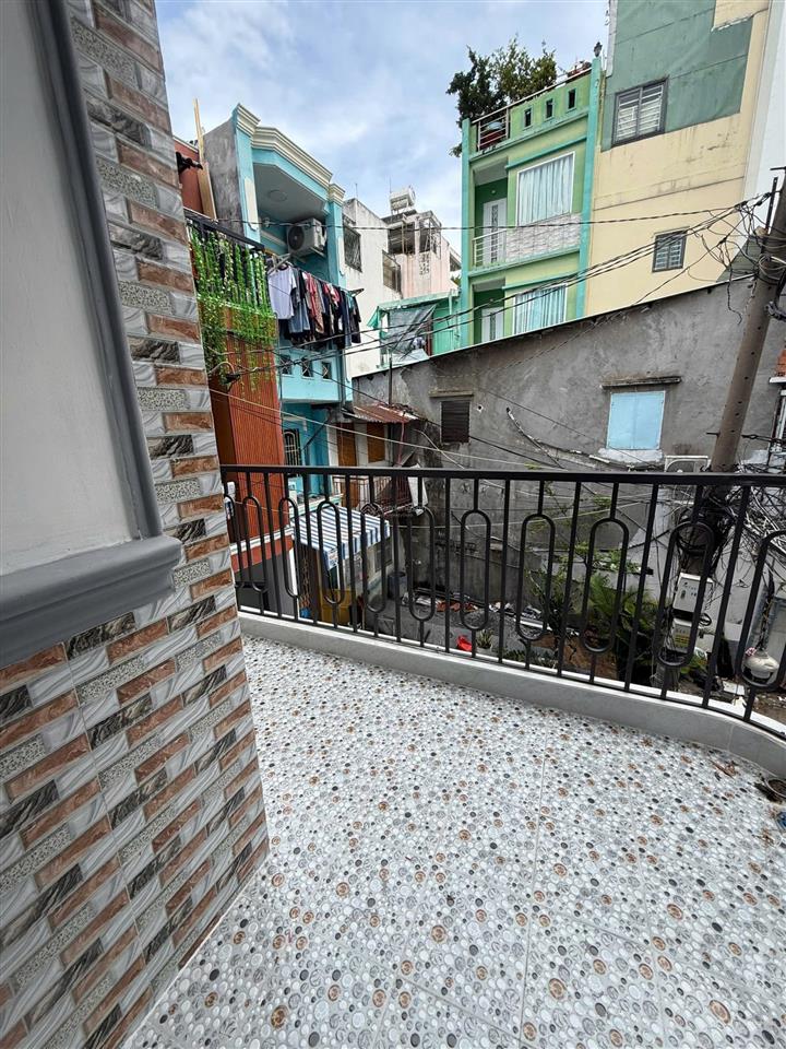 Bán nhà đường 100 bình thới quận 11 chia 2 căn dt 3m* 11,3 m nở hậu 6,5 m giá 4 tỷ 8 hẻm xe hơi