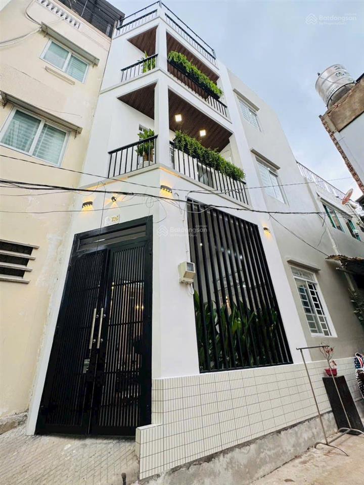 Nhà 4 tầng mặt tiền thục âu dương lân p3  q8