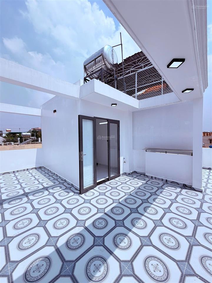 Nhà xây mới 4 tầng sau căn mặt tiền bông sao p5, quận 8