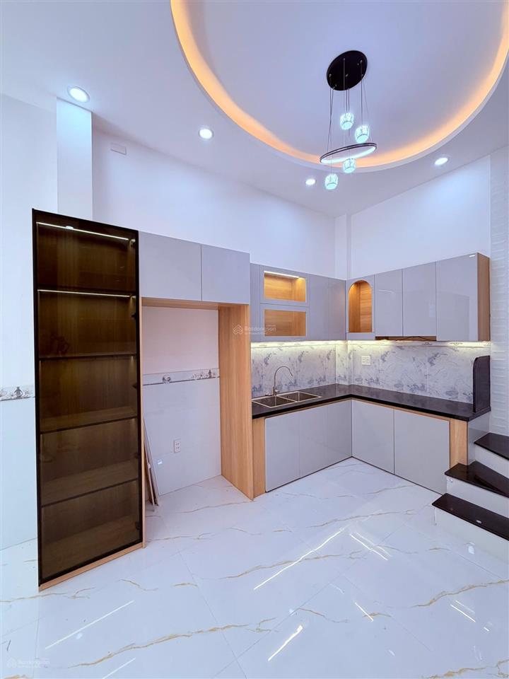 Nhà xây mới 4 tầng sau căn mặt tiền bông sao p5, quận 8