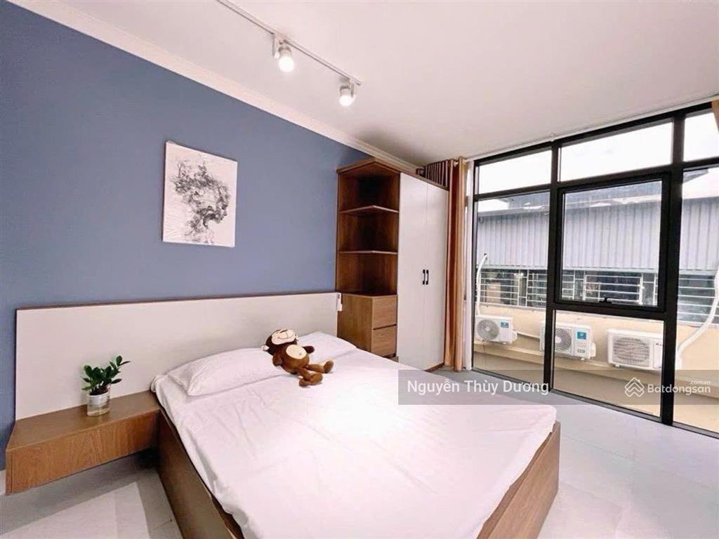 Tòa nhà 9 tầng thang máy 38p, chỉ cách ô tô 10 m. thu 200triệu/ tháng. 99m.mt 6m. chào 31.49 tỷ