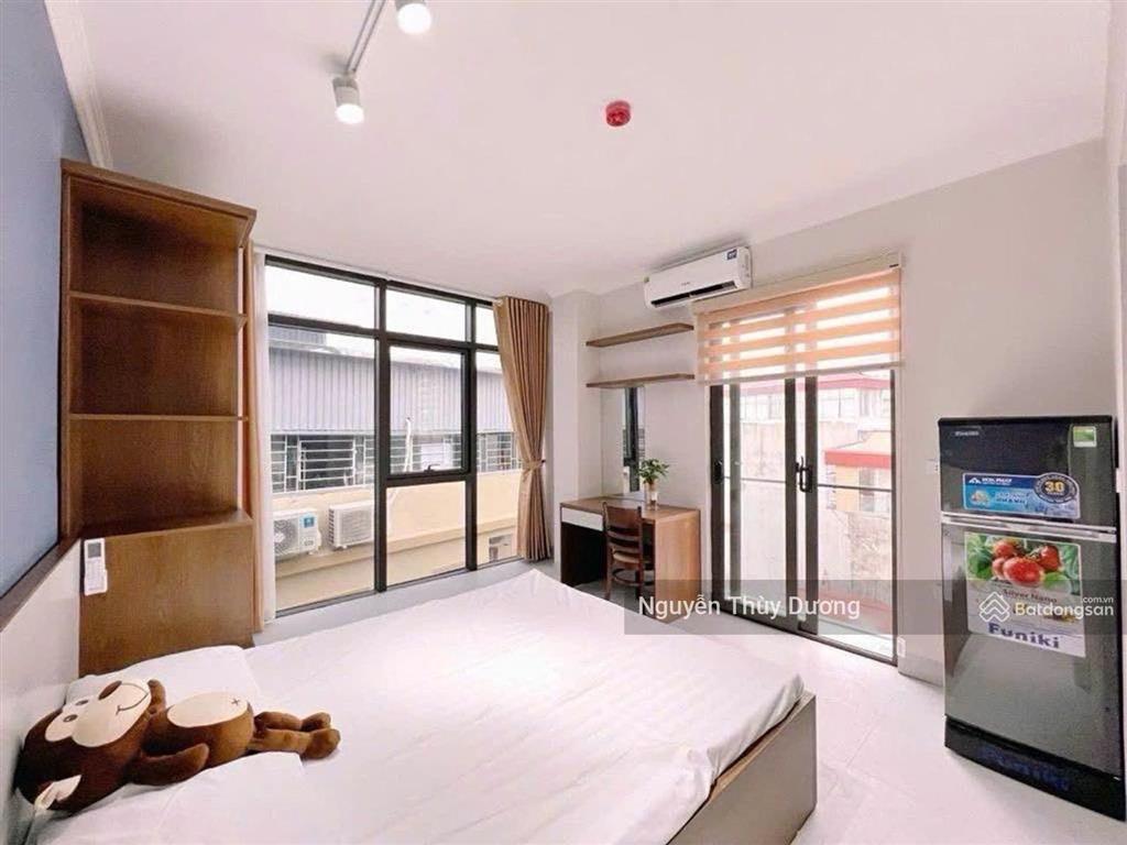 Tòa nhà 9 tầng thang máy 38p, chỉ cách ô tô 10 m. thu 200triệu/ tháng. 99m.mt 6m. chào 31.49 tỷ