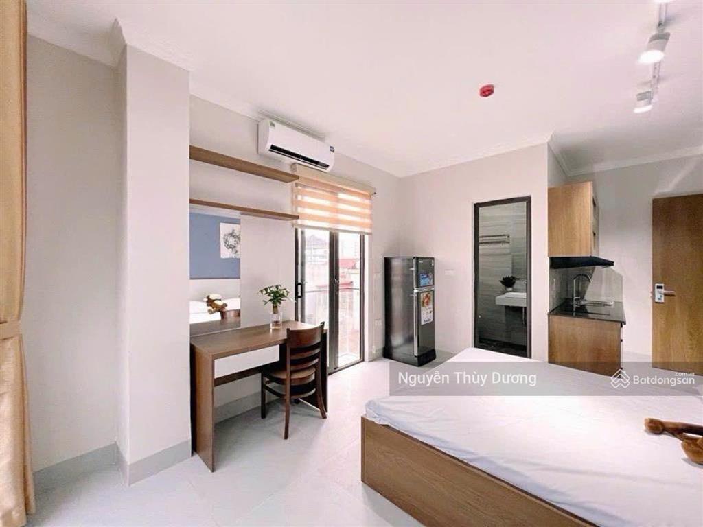 Tòa nhà 9 tầng thang máy 38p, chỉ cách ô tô 10 m. thu 200triệu/ tháng. 99m.mt 6m. chào 31.49 tỷ