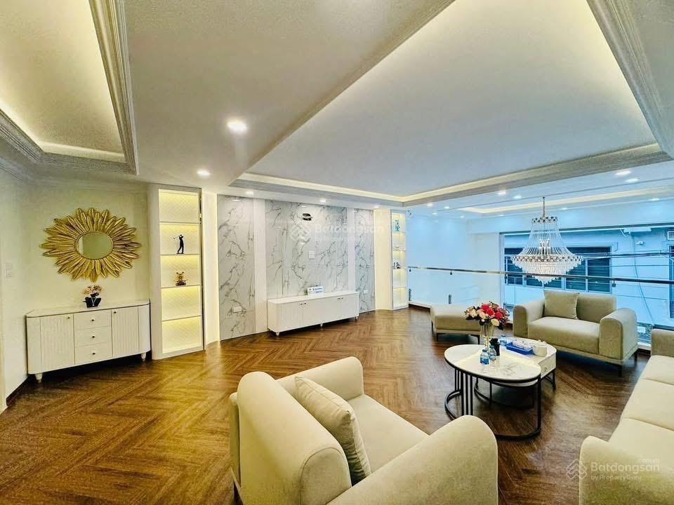 Bán nhà 7 tầng thang máy, mặt ngõ ôtô tránh kinh doanh phố tam trinh. dt74m2  mt5,5m 28,6 tỷ.