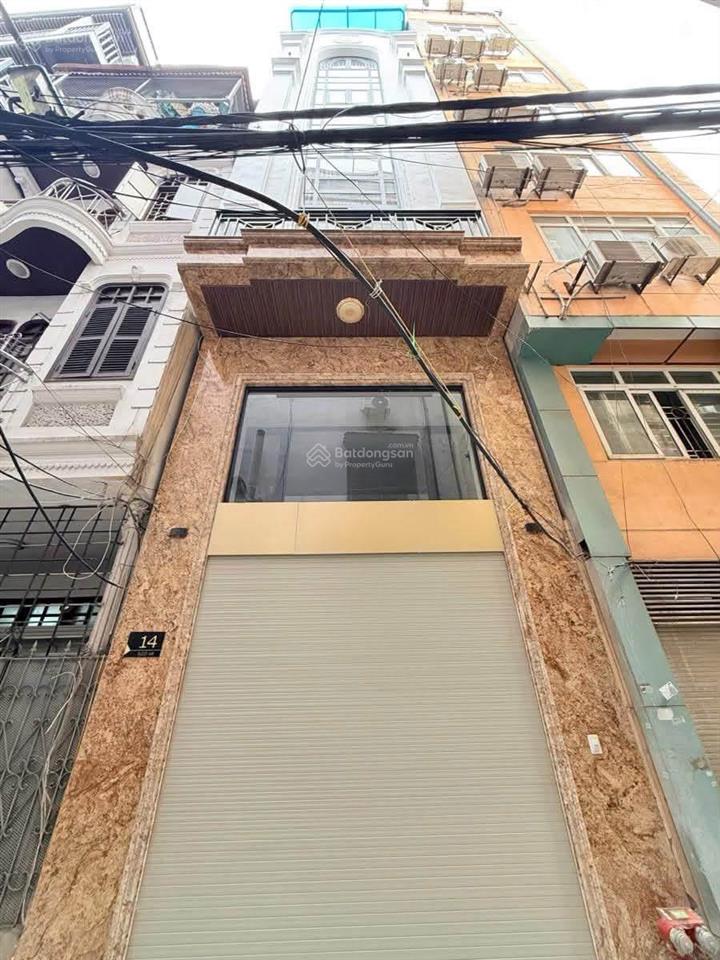 Đáng chú ý. bán nhà mới 8 tầng thang máy, ngõ thông ôtô phố trần duy hưng. 65m2mt4,2m. sổ vuông