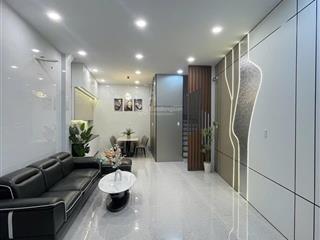 Bán nhà mới xây  nội thất cao cấp + có thang máy  tại hẻm xe hơi 254 âu cơ hơn 40m2 (4 tầng)