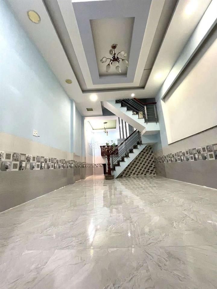 Nhà sổ hồng riêng ngay chợ Lê Văn Quới: 4mx10m đúc 1 trệt 2 lầu