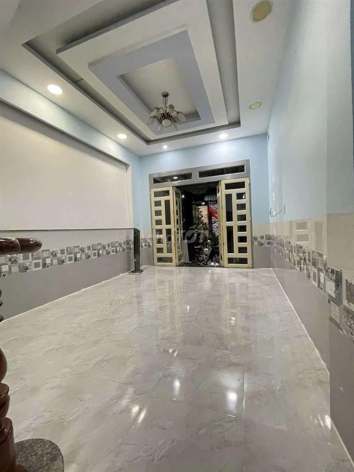 Nhà sổ hồng riêng ngay chợ Lê Văn Quới: 4mx10m đúc 1 trệt 2 lầu