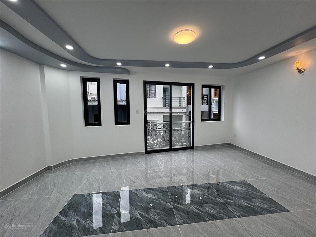 Cho thuê biệt thự mini 3 lầu, xây mới 100%đ/c  113/21a trần quang diệu, q.3đi hẻm 402 lê văn sỹ
