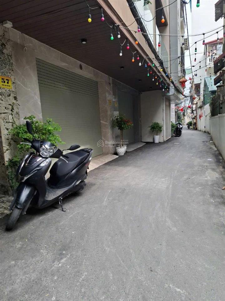 Một nhà ra phố hồng tiến. 50m2 thiết kế 7 tầng thang máy. gara 7 chỗ. giá cực tốt 13.5 tỉ