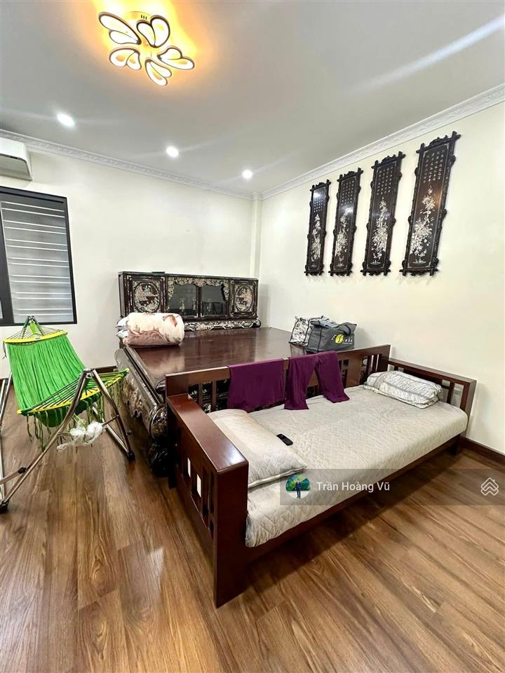 Bán nhà dt 42m2 x 7 tầng, mặt tiền 5m, ô tô đỗ cửa cách 1 nhà ra phố tam khương  đống đa
