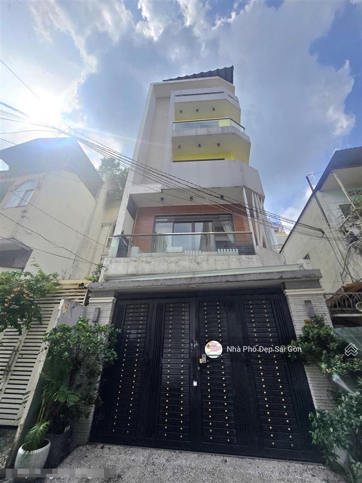 Bán nhà hxh lạc long quân, p9, tân bình. dt 5x14m  đúc 5 tầng nhà đẹp  ntcc