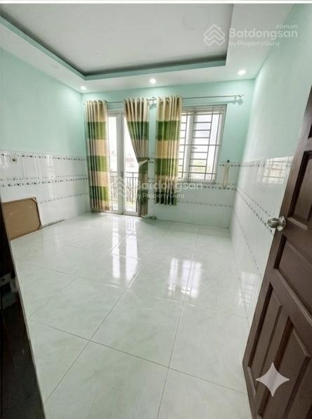 8.99 triệu/tháng  nhà 1 trệt 2 lầu 4 phòng ngủ 3wc đường xe hơi có gara để ô tô p.long trường, q.9