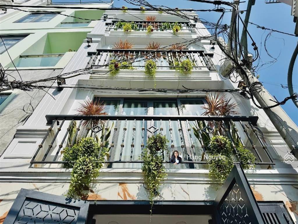 Bán nhà cho thuê 27tr/tháng gần cầu tân thuận, huỳnh tấn phát  7,6 tỷ