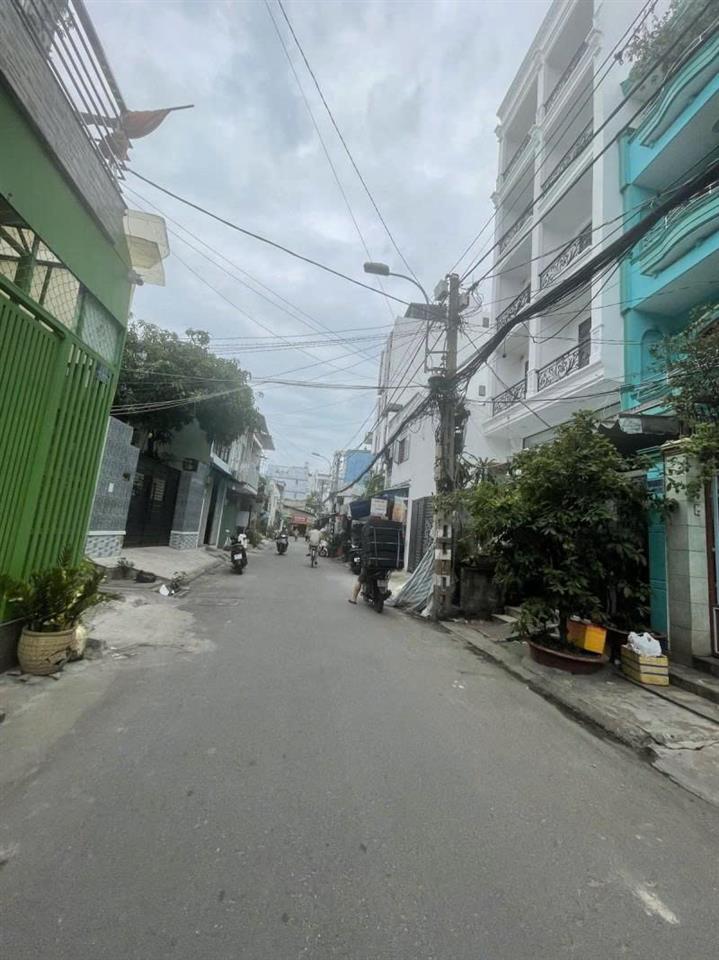 Bán nhà Mặt tiền Hoàng Xuân Nhị - giao Âu Cơ, 5,1x17m, hiện trạng C4 - tiện xây, 10,5 tỷ.