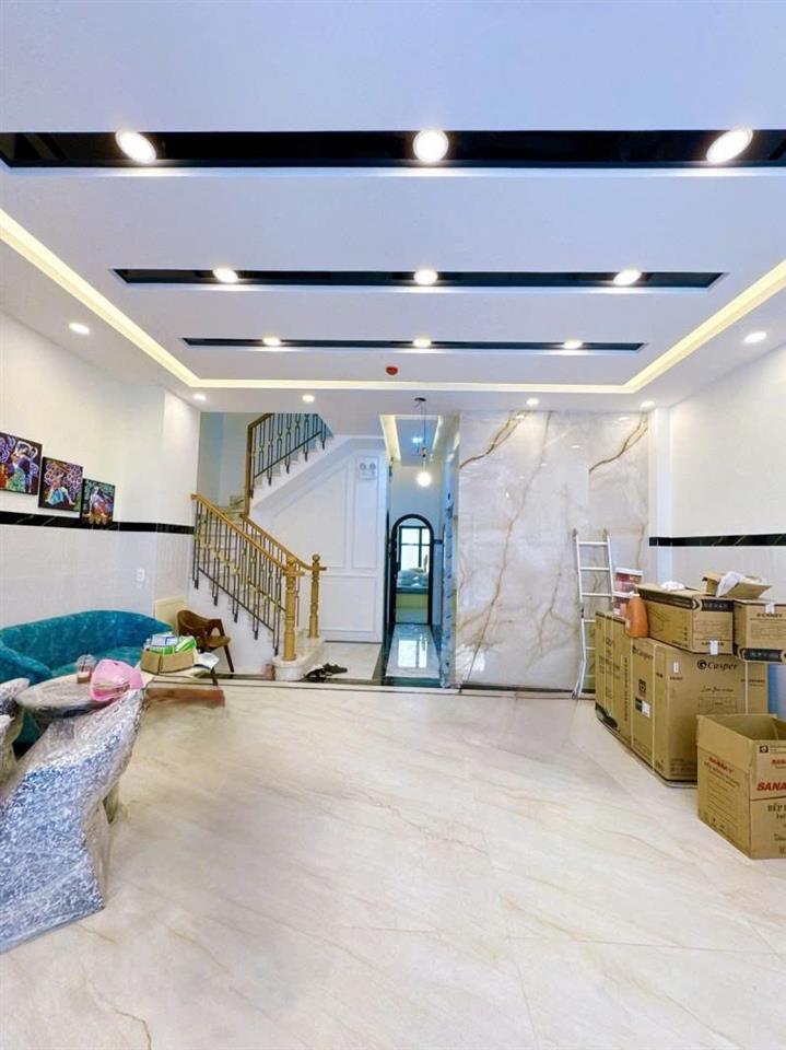 Bán nhà HXH 6m Lưu Nhân Chú - giao Phạm Văn Hai, 5,8x18m, 4 Tầng - 12PN, chỉ 20,5 Tỷ,
