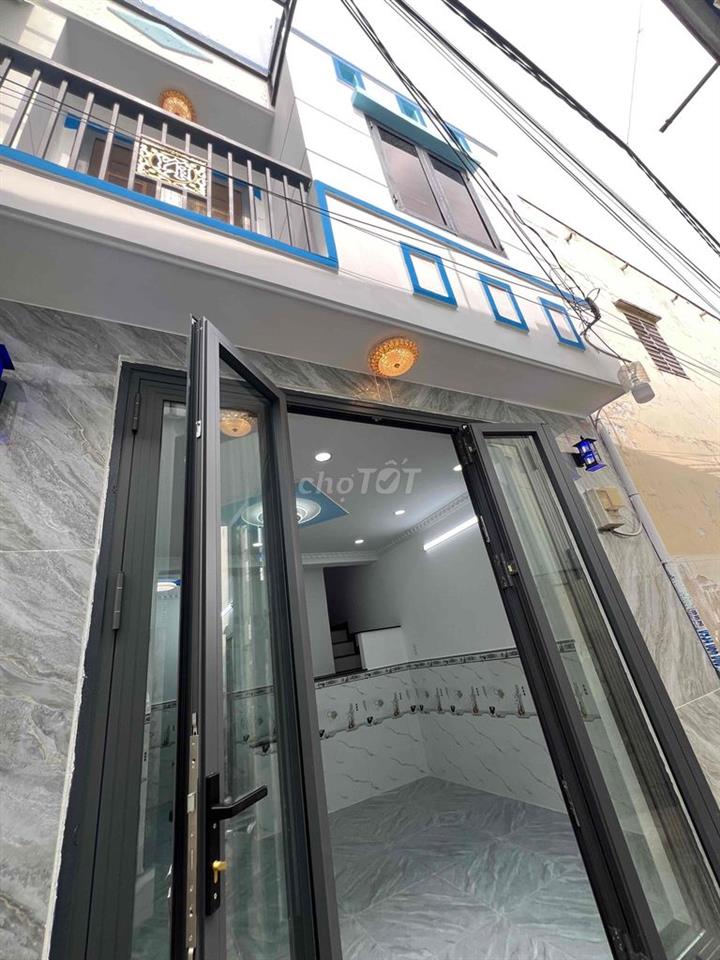 Nhà phố Mới 1 trệt 1 lầu  30m ra đường thới tam thôn 10 -hóc môn