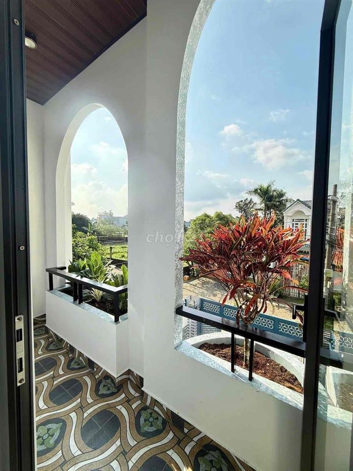 nhà phố Hóc Môn 4x21m 1 trệt 2 lầu mặt tiền đường Tân Hiệp 39+40