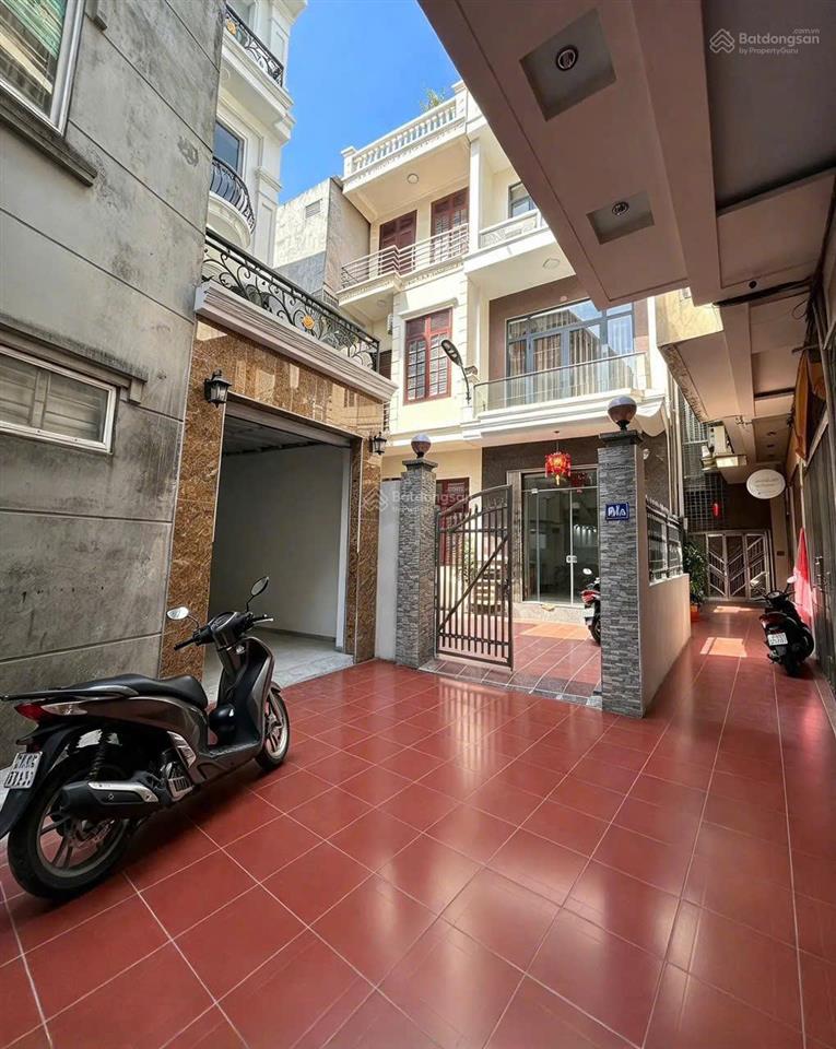 Nhà xây mới 4 tầng thang máy  3 bước ra mặt chợ hàng ngập tràn tiện ích