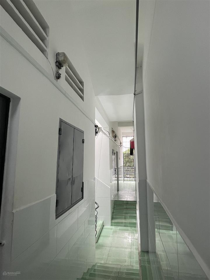 Bán chdv mặt tiền nhựa 18m phường dĩ an, thu 30tr/th. nhà 1 trệt 2 lầu 14 căn hộ và 1 kiot