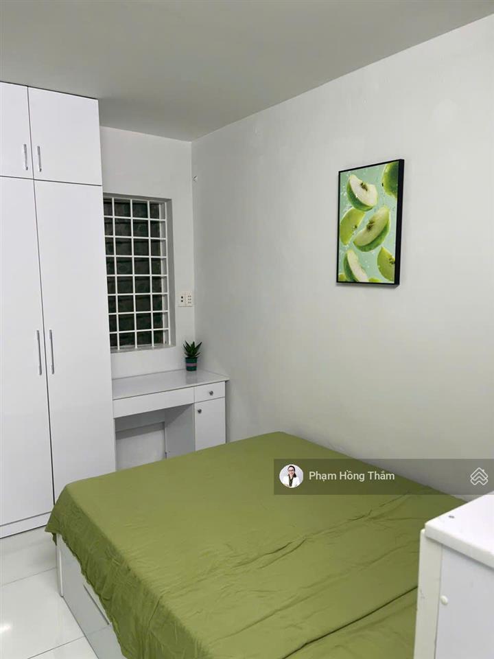 Bán căn hộ phan văn trị, dt 54.5m2, 2pn, 2wc, nhà đẹp, sổ hồng, giá 3.35 tỷ.  0933 888 ***  thắm