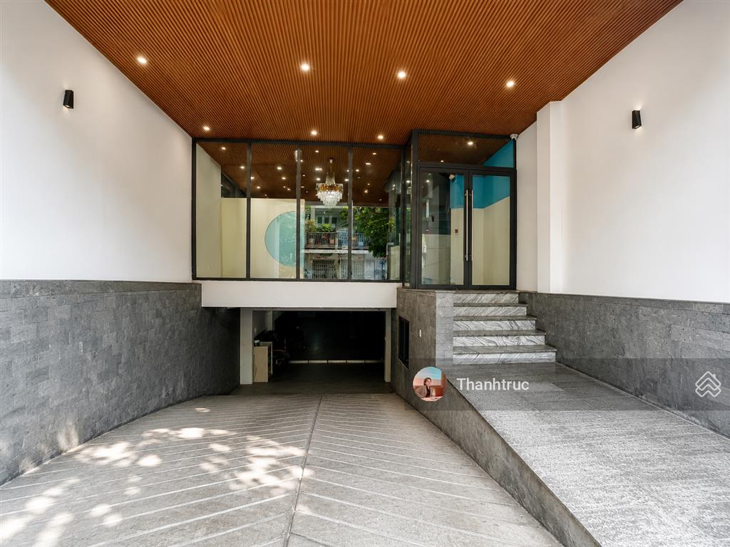 Building thạch thị thanh quận 1 | hầm + 5 lầu, thang máy