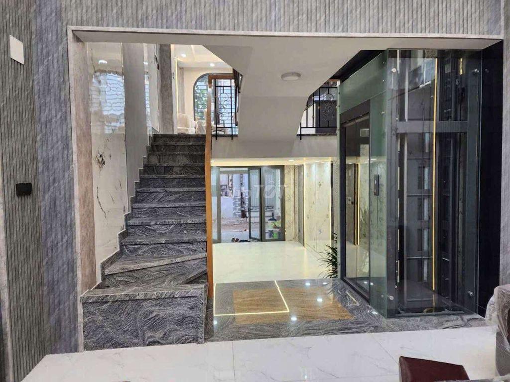 nhà mới xây có thang máy hẻm nhựa 6m Lý Chiêu Hoàng