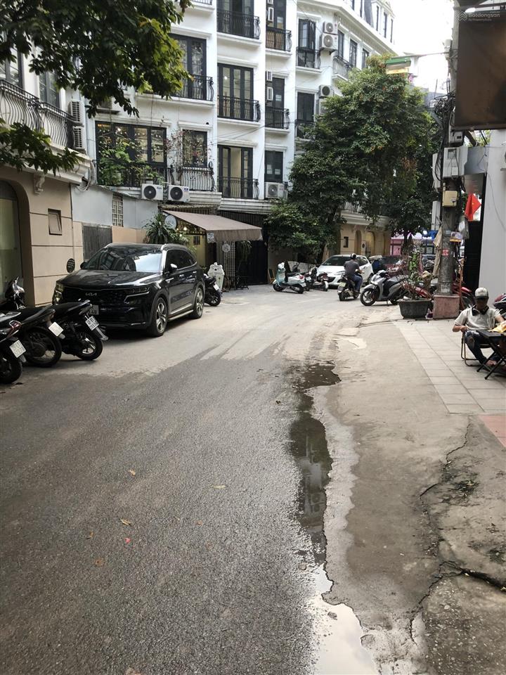 Bán tòa văn phòng 7 tầng lô góc đường 8 m thang máy 54,1 m giá 24 tỷ lê quang đạo sát svđ mỹ đình