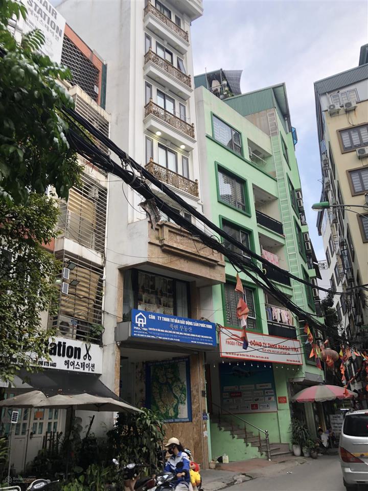 Bán tòa văn phòng 7 tầng lô góc đường 8 m thang máy 54,1 m giá 24 tỷ lê quang đạo sát svđ mỹ đình