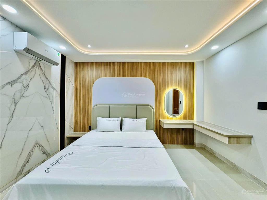 Quang trung p11 gò vấp  diện tích 4m x 20m
 kết cấu 1 trệt lửng 4 lầu
 sát siêu thị bv. ca