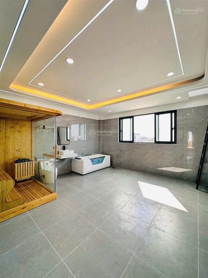 Nhà mặt tiền kinh doanh + thang máy cao cấp đường 12m. dt 5m x 17m 1 lửng 3 lầu gần hà huy giáp