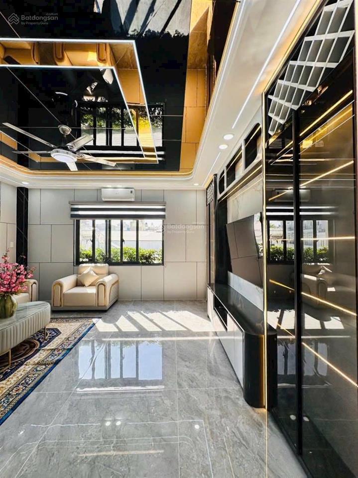 Nhà mặt tiền kinh doanh + thang máy cao cấp đường 12m. dt 5m x 17m 1 lửng 3 lầu gần hà huy giáp
