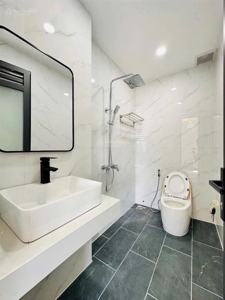 Nhà mặt tiền kinh doanh + thang máy cao cấp đường 12m. dt 5m x 17m 1 lửng 3 lầu gần hà huy giáp